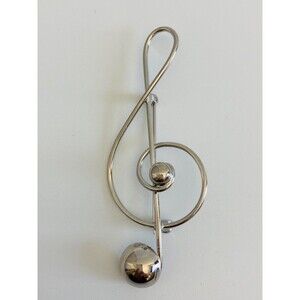 Vintage signed sterling silver Lang music note brooch